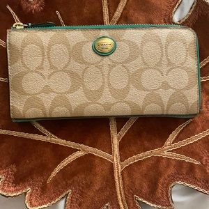 Coach tan and green wallet